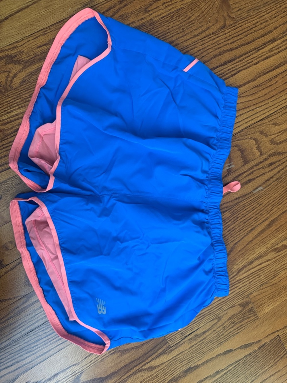 New Balance Blue Athletic Shorts with Pink Trim